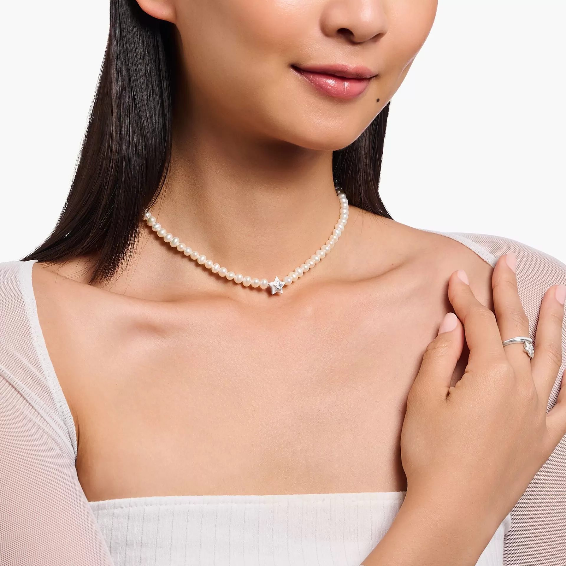 THOMAS SABO Halsband | Glow in the Dark<CHOKER-P&AUML;RLHALSBAND MED STJ&AUML;RNA OCH VIT KALLEMALJ SILVER silverfargad, vit